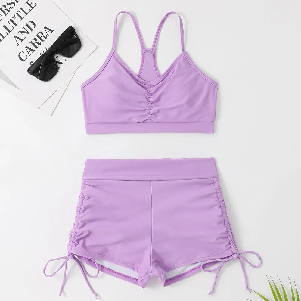 Purple women's high waist split bikini swimsuit two-piece set on a mannequin.