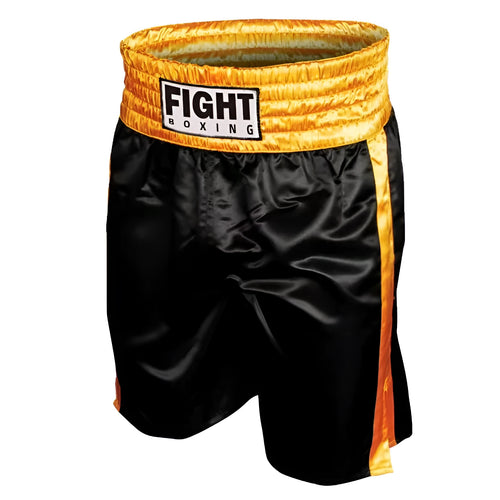 Man wearing black and white boxing shorts with side stripes during a training session