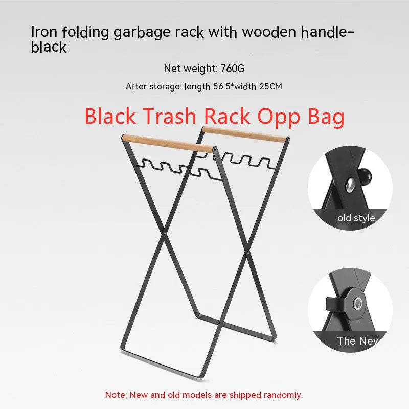 Black folding outdoor trash rack with a wooden handle, holding a rubbish sack.