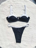 Black women's low-waist bikini swimsuit with brief bottoms and side stitching.