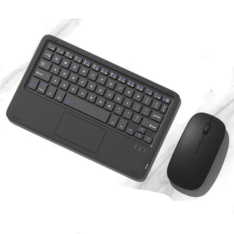 Pink wireless keyboard and mouse combo with slim touch keyboard and Bluetooth connectivity on wooden desk