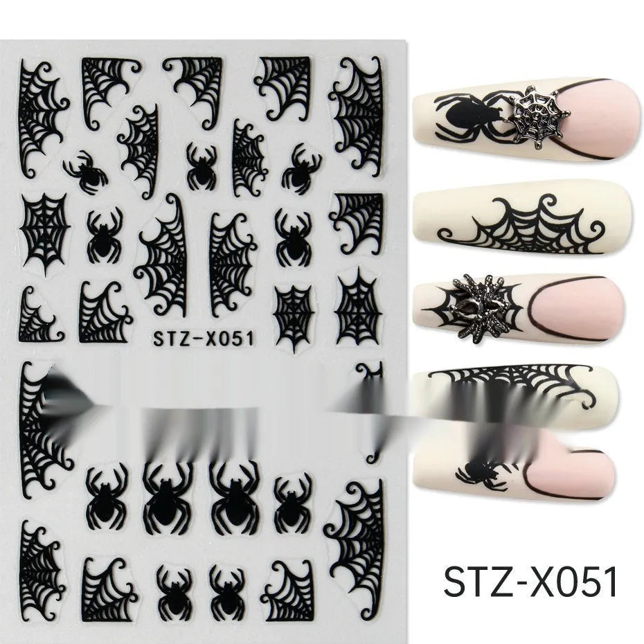 Plastic sheet of black, silver, and cartoon design nail art stickers for DIY manicures.