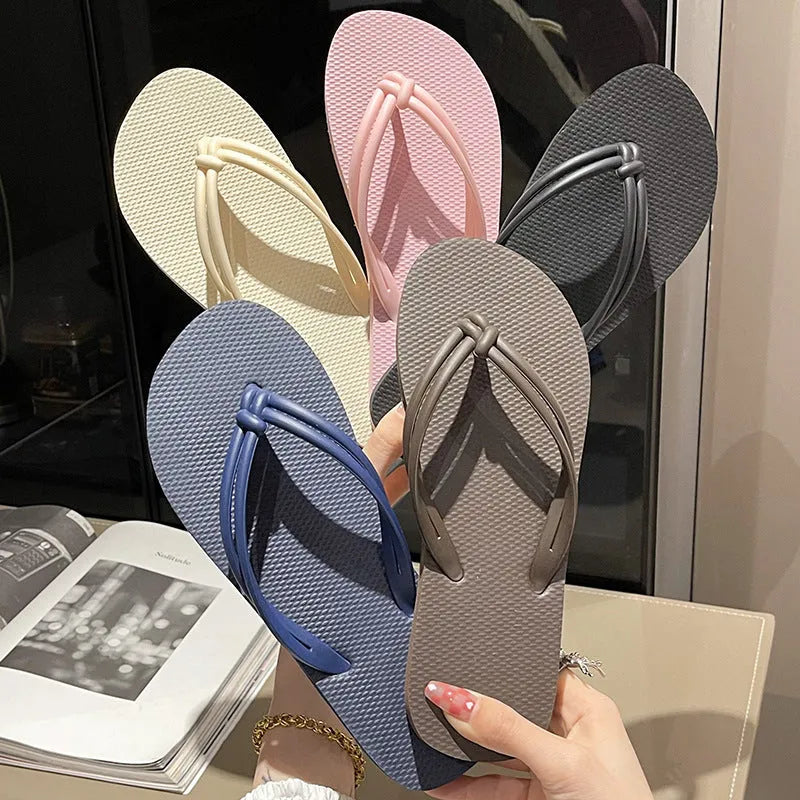 Men's closed-toe PVC flip flops in multiple colours on a plain background.