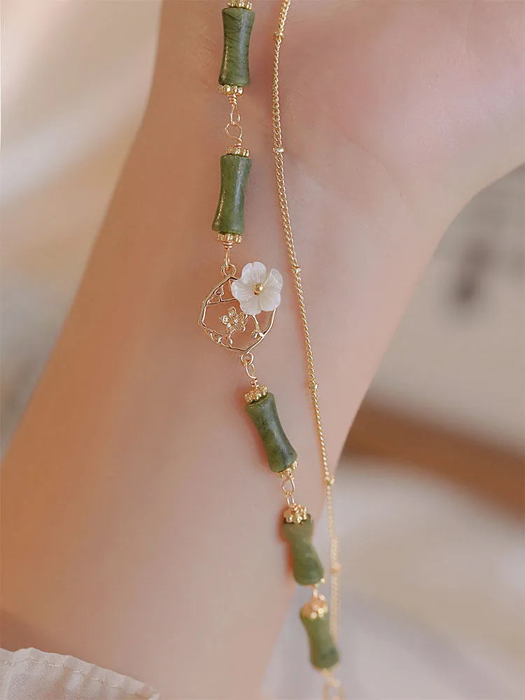 Natural green olivine stone bracelet with twin bells and double layer design