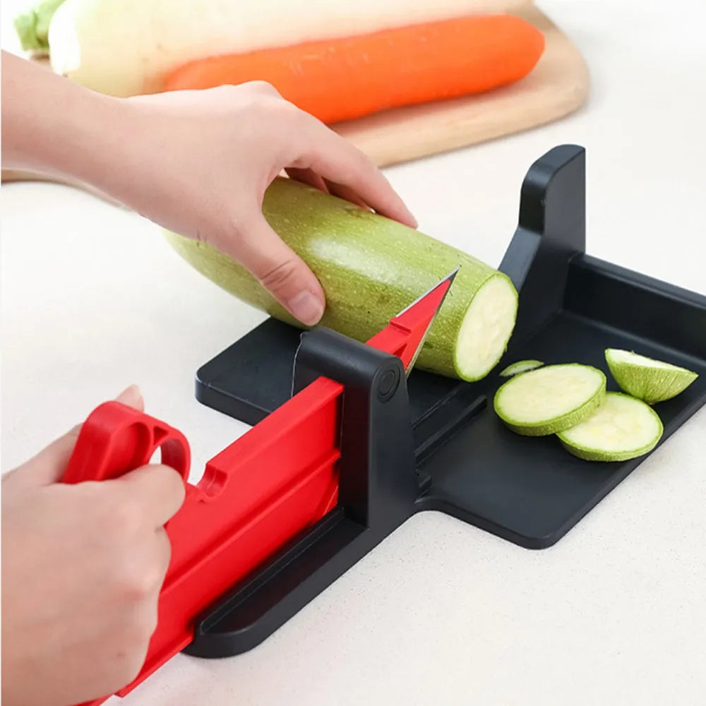 Green plastic vegetable cutter with stainless steel blades for cutting carrots and potatoes