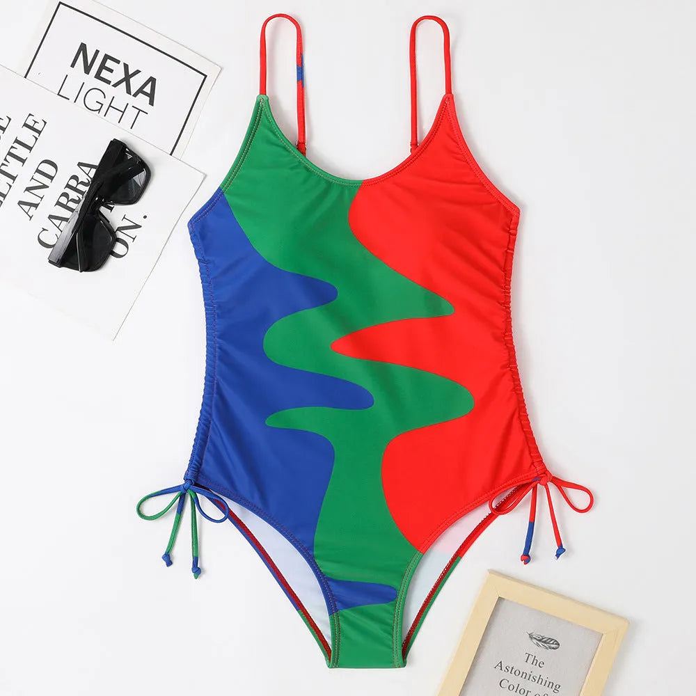 Blue women's sleeveless one-piece swimsuit with fixed swimming trunks on a mannequin.