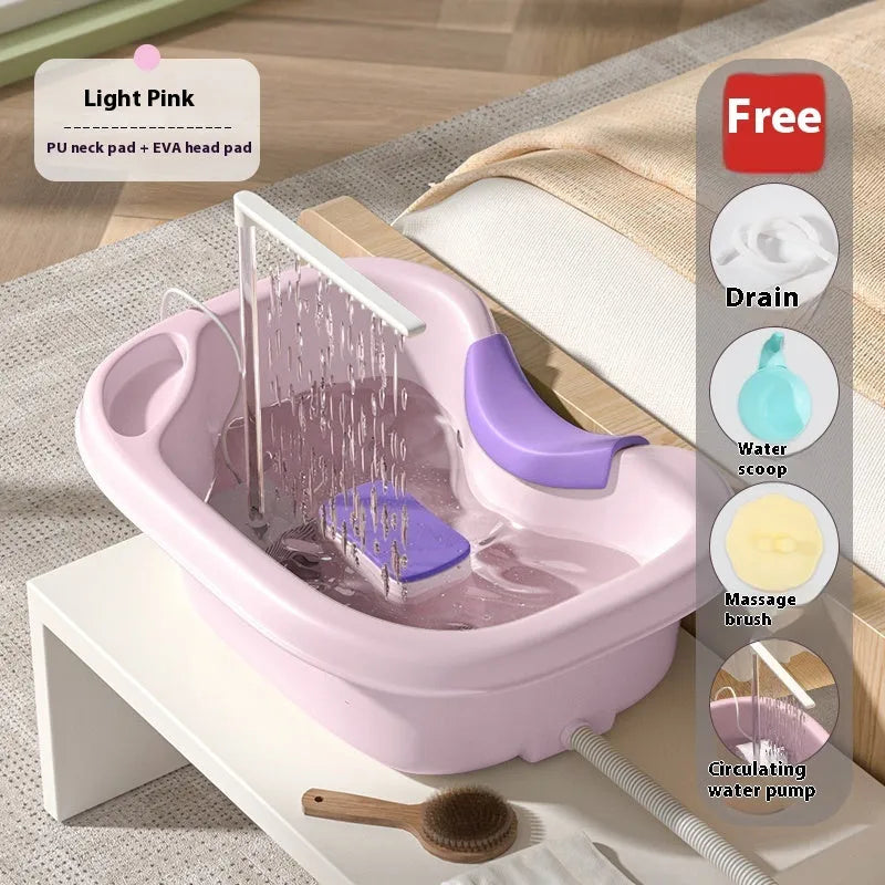 Light pink and beige plastic shampoo basin sets for bed use, showing adjustable neck pillow, water pump, and massage brush.