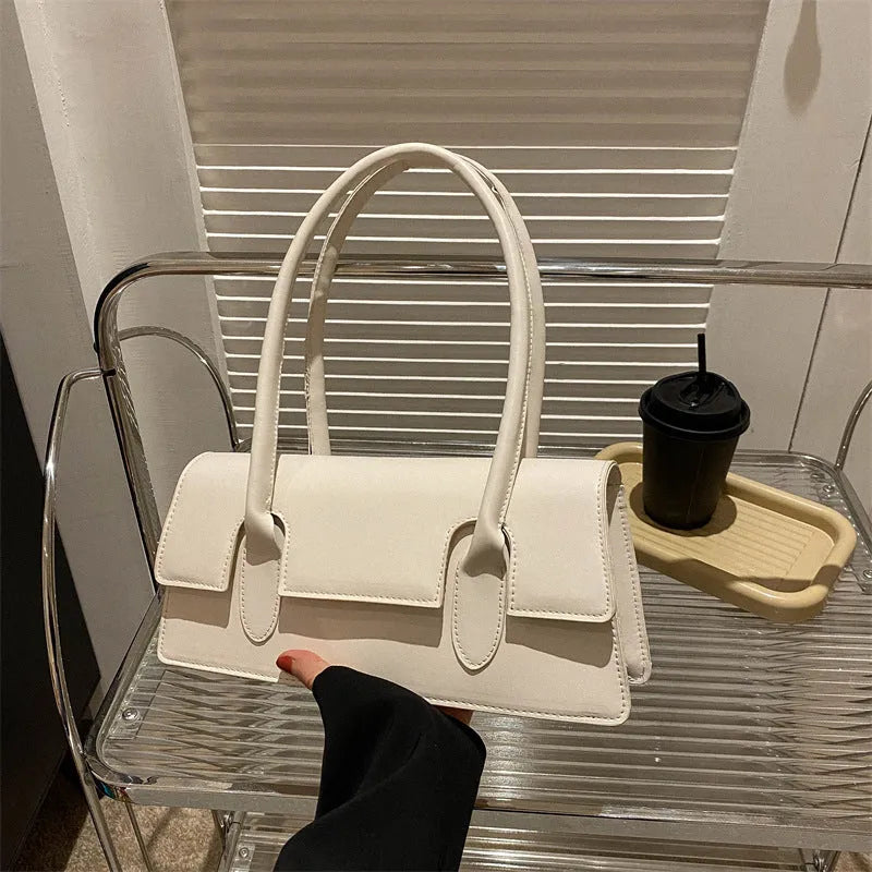Women's small square shoulder bag in PU leather with document pocket and stitching detail