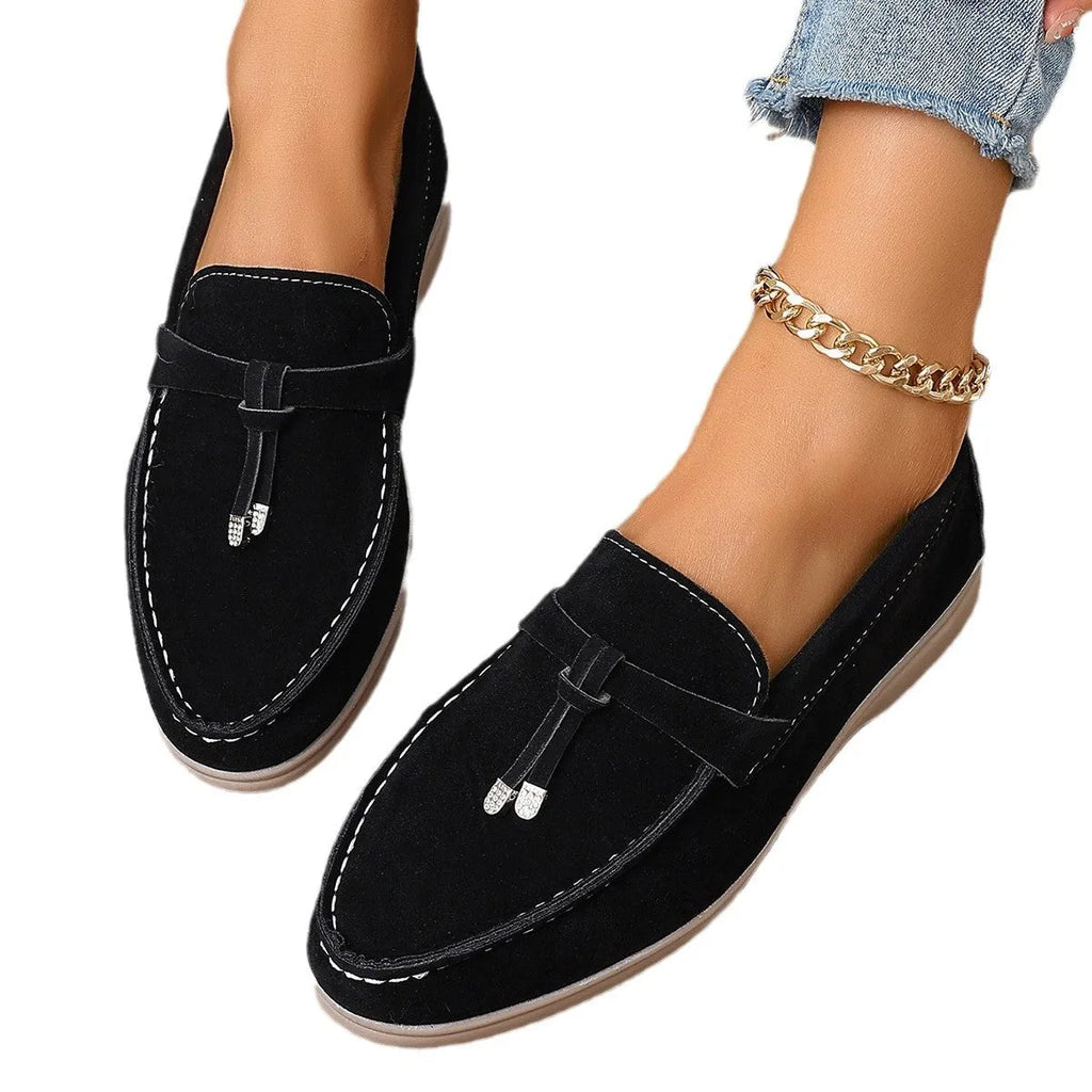 Casual canvas slip-on loafer shoes with a platform heel, shown in solid colour options.