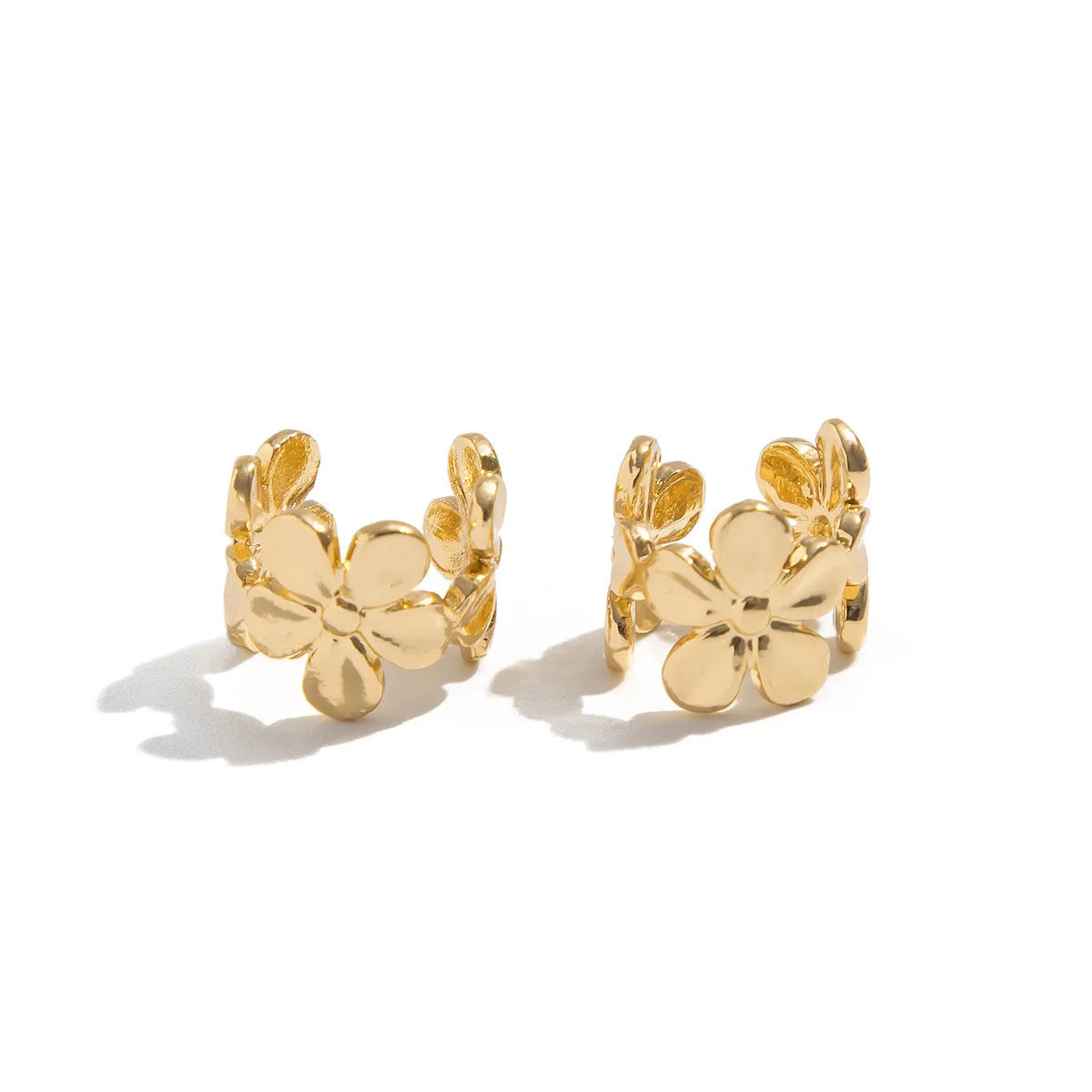 Gold starfish and conch drop earrings for women with electroplated alloy construction