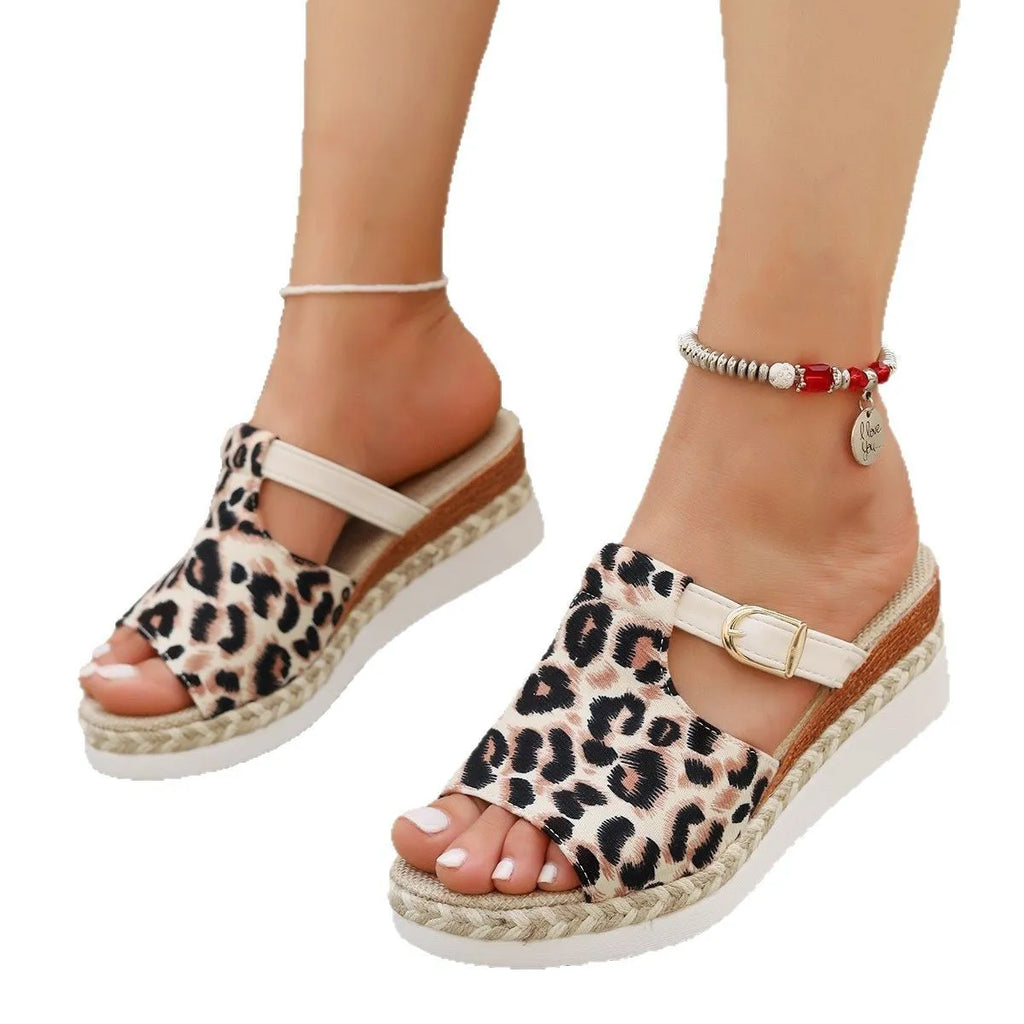 Leopard print wedge platform sandals with a fish mouth toe in light green.