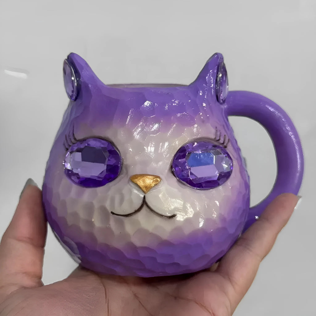 Crystal Earth Cat Cup resin craft decorative object in purple, green, blue, or pink colours.