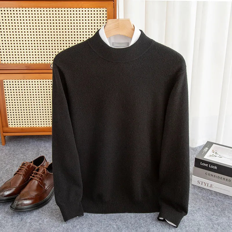 Man wearing a loose-fit half-collar wool sweater in a textured knit, shown in one of the available colours like camel or dark grey.