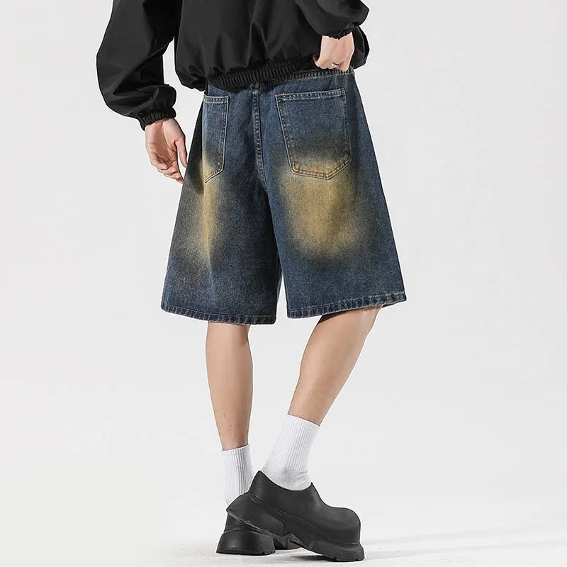 Retro blue loose fit jeans with ripped detailing in cotton denim fabric
