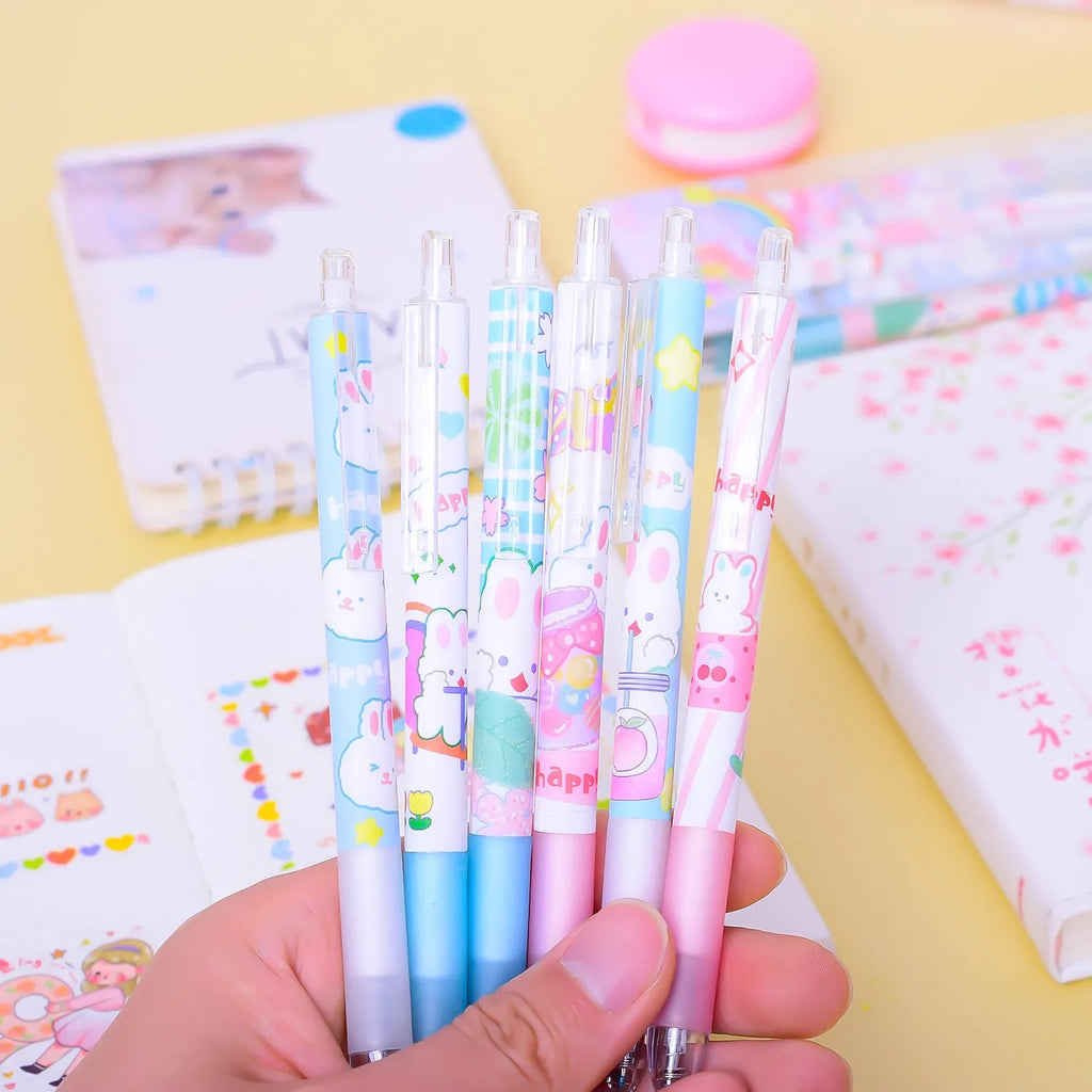 Six black plastic pens with cartoon bunny design and 0.5mm fine tips in an open box.