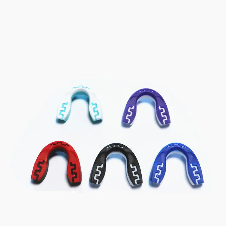 Adult boxing mouthguard with tooth socket design in black and white, red and white, and blue and white colour options.