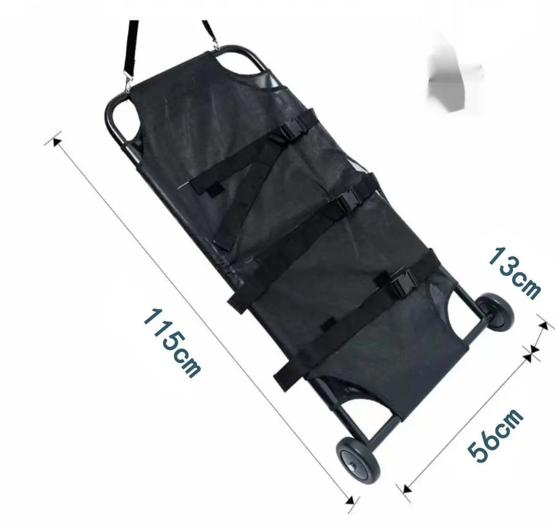 Black foldable aluminium alloy pet stretcher for large dogs, shown in emergency transport use.