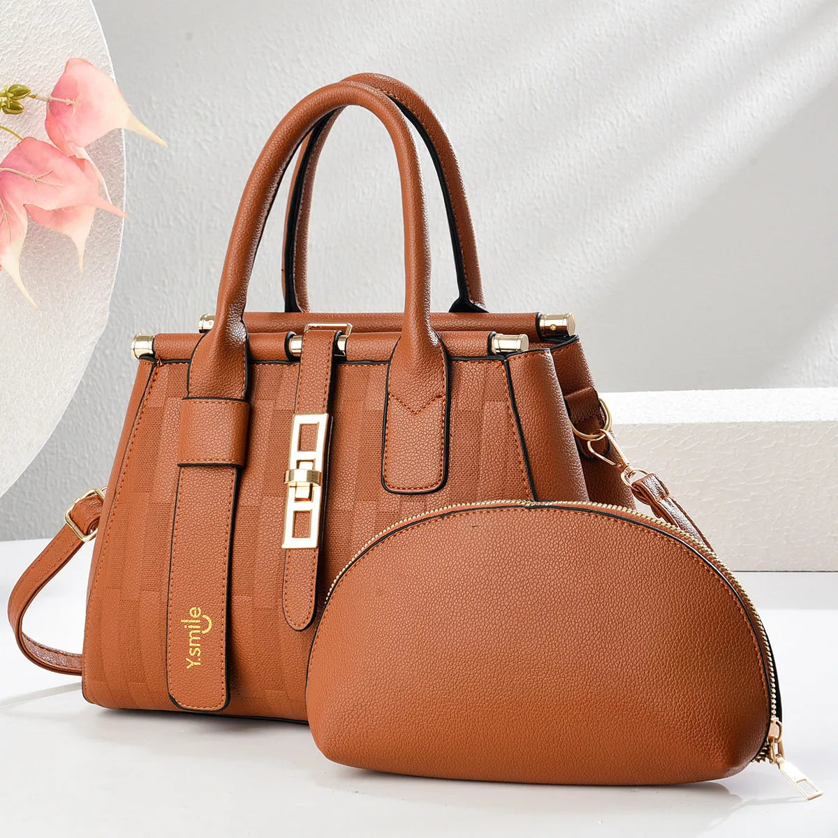 Round black PU crossbody shoulder bag showing front view with adjustable strap.