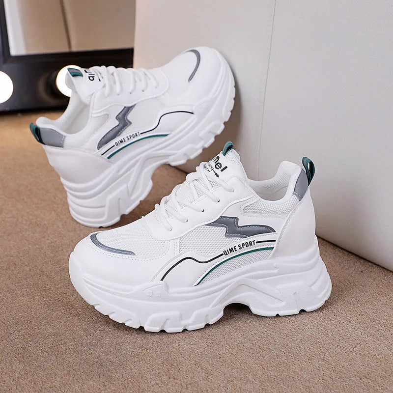 Women's white and beige dad shoes with cross straps and height increasing insoles