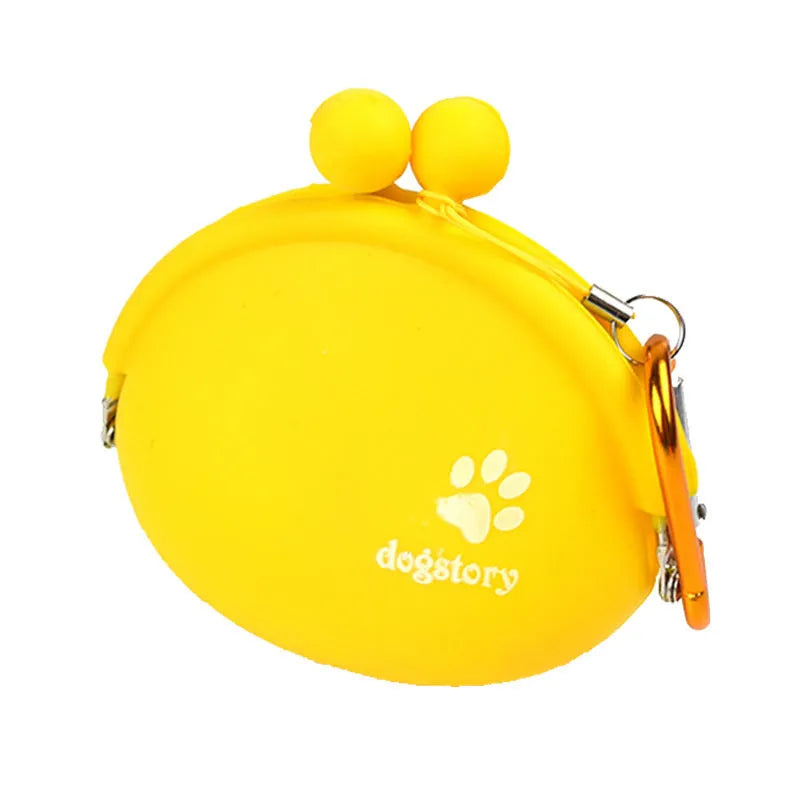 Yellow silicone dog treat pouch attached to waist belt for hands-free training