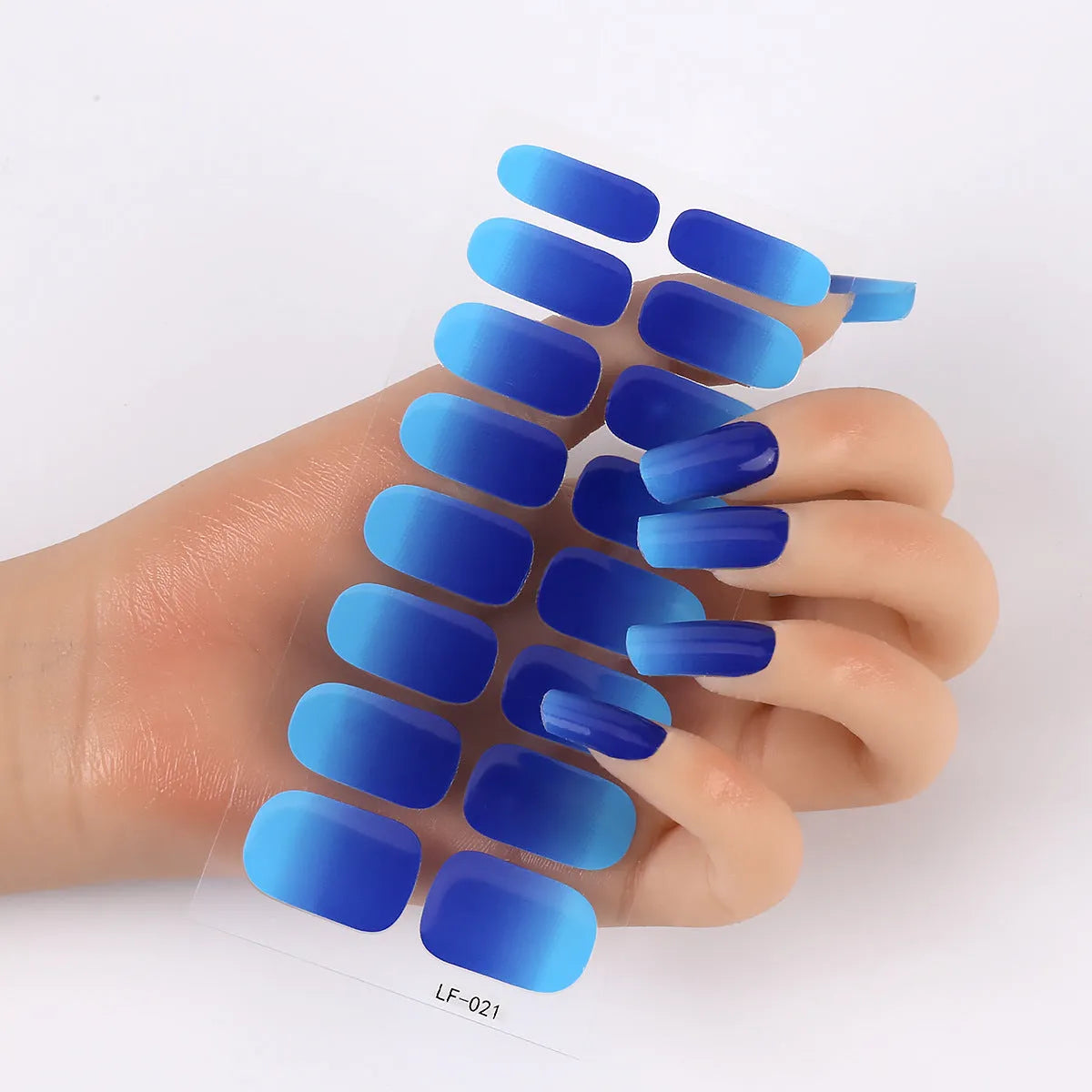 Full nail art sticker sheet showing 16 different solid colour designs including European simple nails and floral patterns