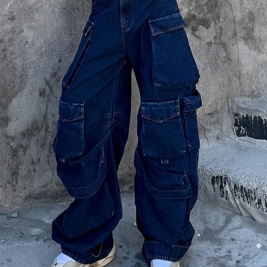 Dark blue distressed wide-leg jeans with high waist and multiple pockets on mannequin