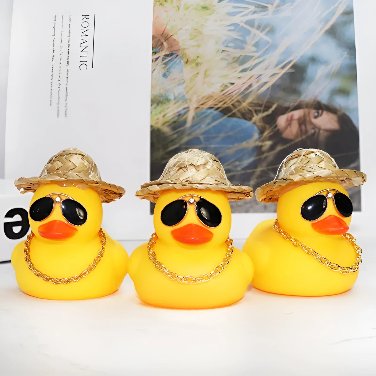 Yellow cartoon duck car ornament with straw hat and adhesive mounting kit