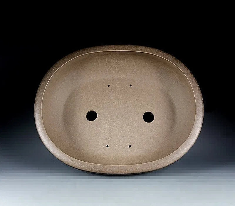 Handmade oval purple sand flowerpot in black mud green colour measuring 50x39.5x16cm