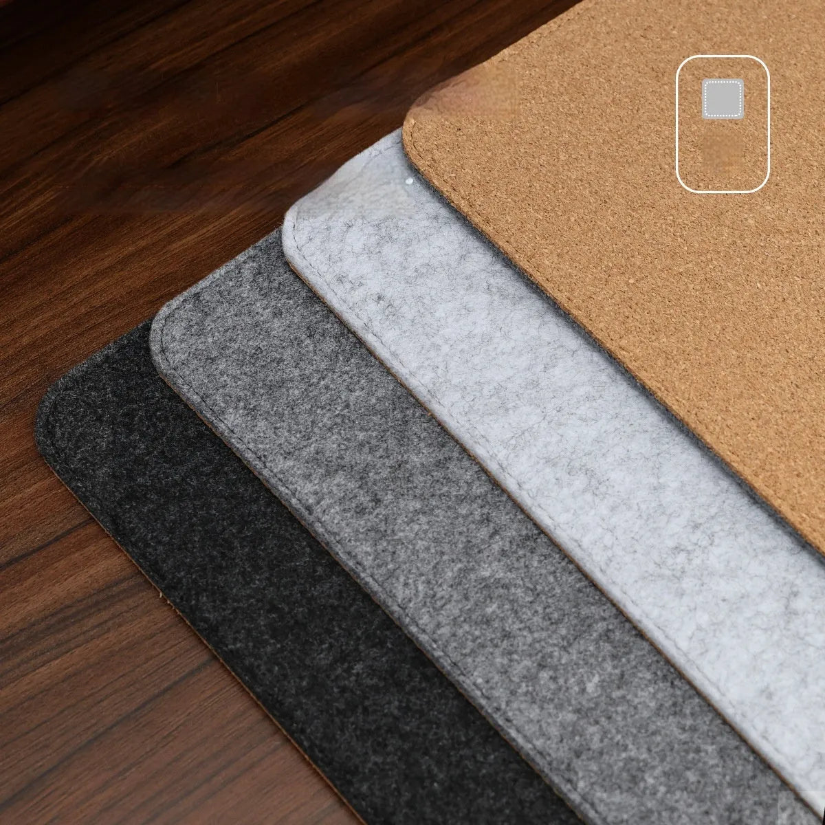 Oversized felt and cork office mouse mat showing black grey colour option on desk