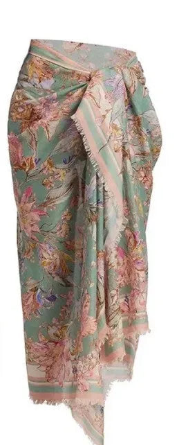 Women's creamy-white floral bikini set with matching skirt for beach and swimming