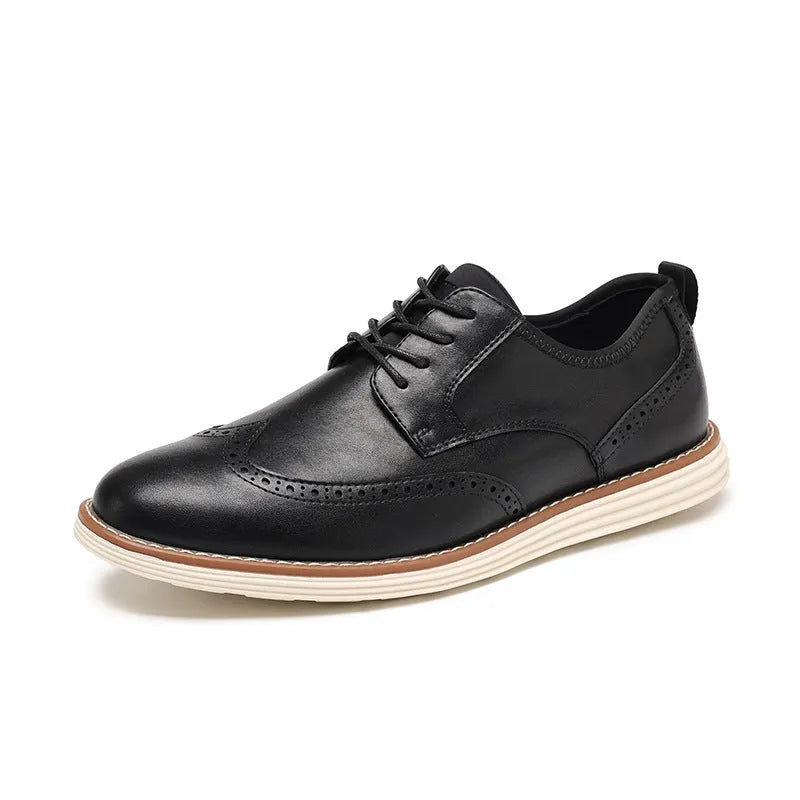 Men's black slip-on business casual shoes with round toe and decorative carving details