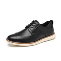 Men's black slip-on business casual shoes with round toe and decorative carving details