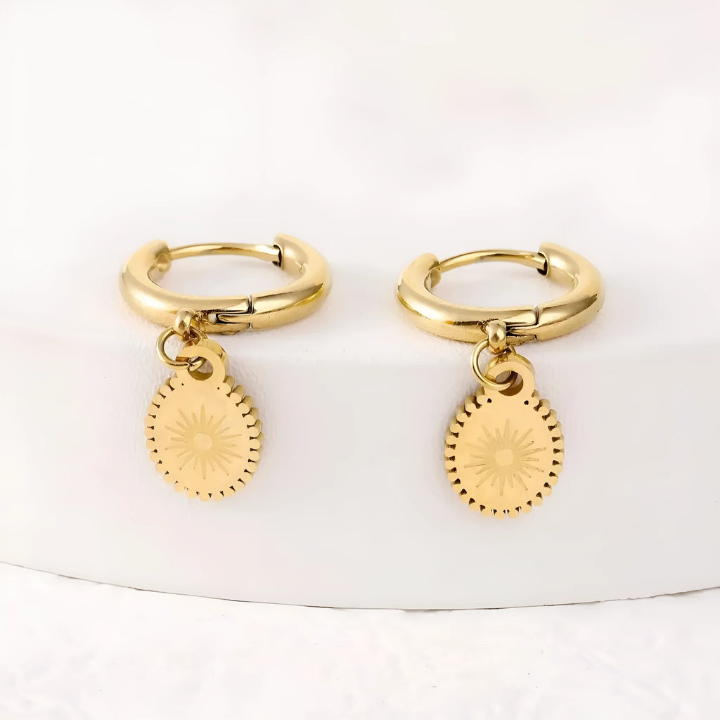 Stainless steel geometric earrings with ellipse shape and ear button closure in colour XY-EH005