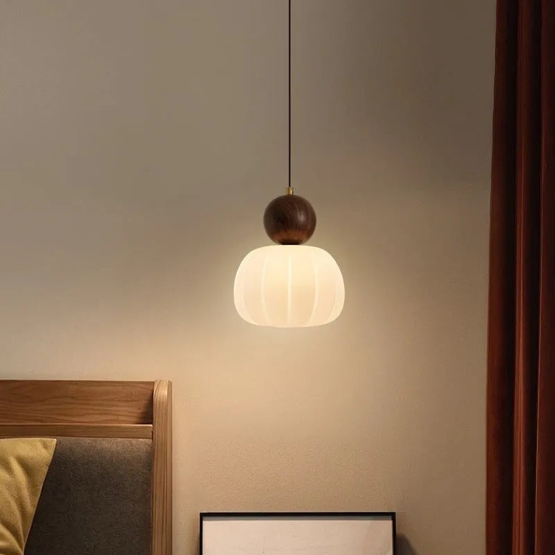 Nordic style pumpkin-shaped alloy chandelier for ceiling mounting in a bedroom or dining room.