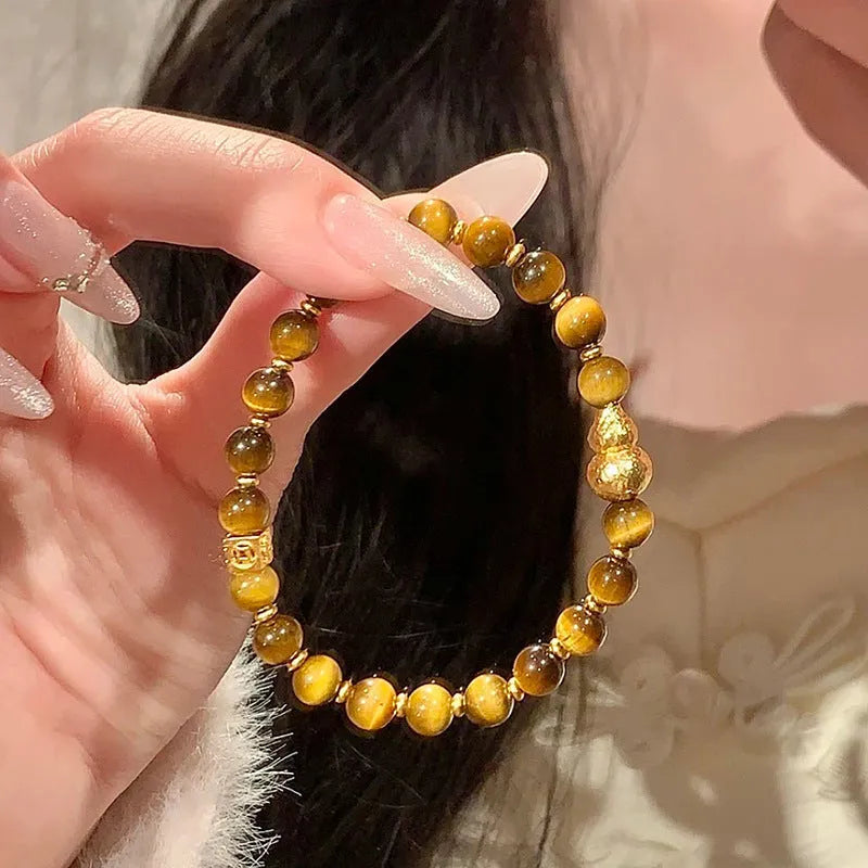 Natural yellow Tiger's Eye bracelet with Chinese auspicious patterns in U-shaped design