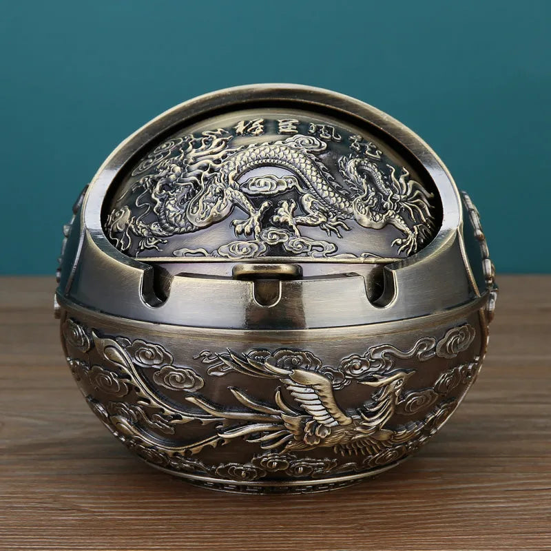 Alloy ashtray with smoke extinguishing slot in bronze finish featuring decorative dragon and phoenix design