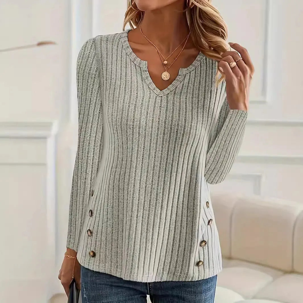 Men's solid colour buttoned knitted sweater on a hanger, showing grey green option.