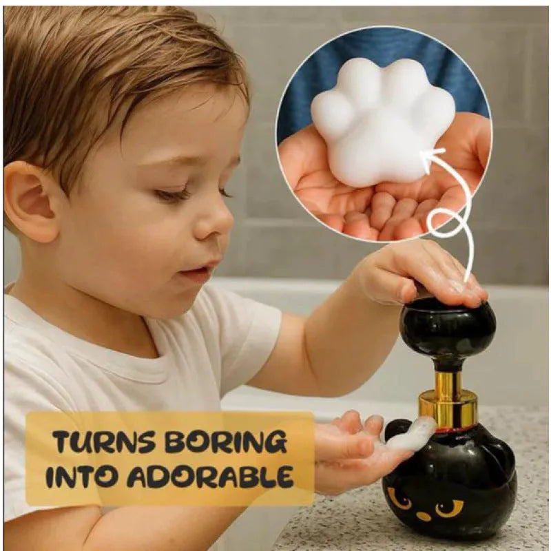 Black plastic cartoon cat-shaped foam soap dispenser measuring 10x10x18cm