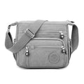 Nylon shoulder messenger bag in square vertical design with single strap