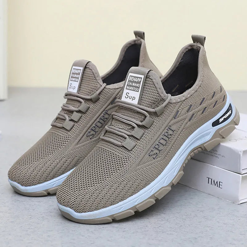 Men's and women's casual low-top sneakers with a soft PVC sole in black, red, light purple, grey, and brown.