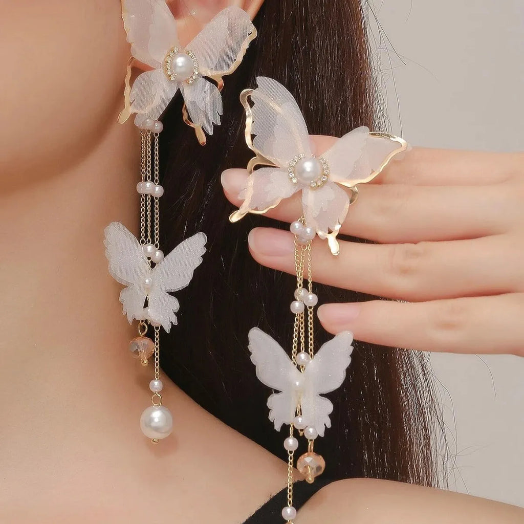 White butterfly tassel lace pearl rhinestone earrings with electroplated copper alloy construction