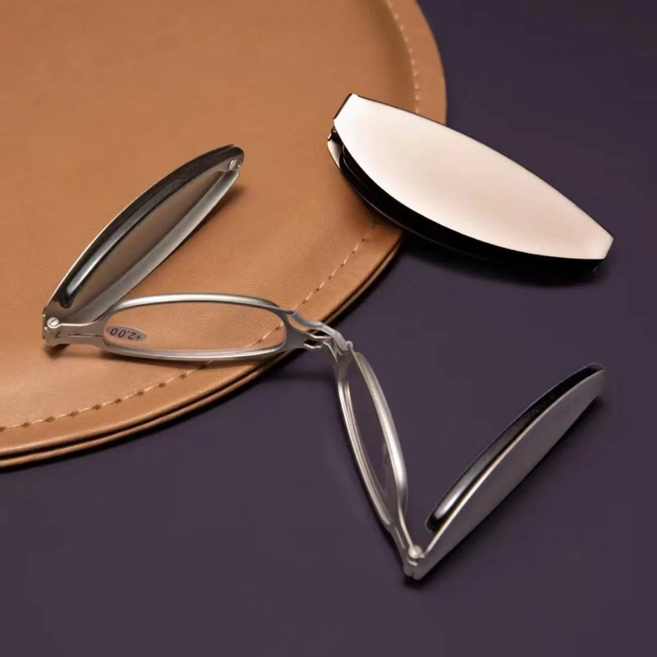 Black retro-style folding reading glasses for men, shown open and folded