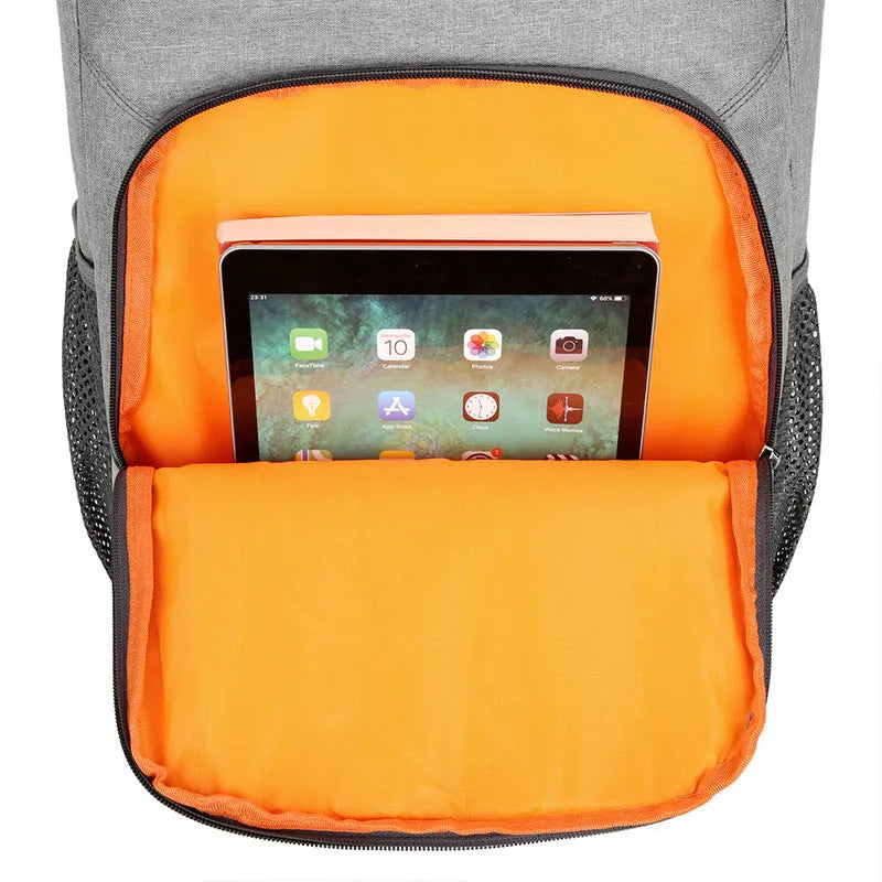 Large outdoor thermal picnic backpack in grey-orange colour with curved shoulder straps and compartments.