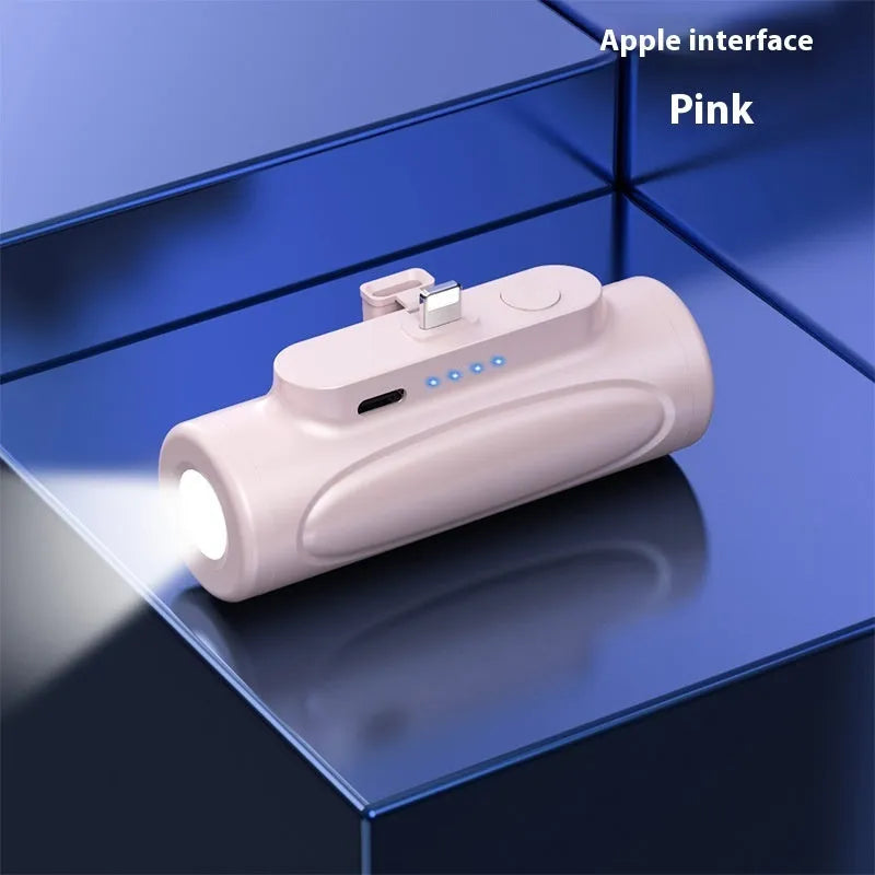 Black and pink creative power bank with LED flashlight, showing Type-C and Apple port options, 83x27x41mm.