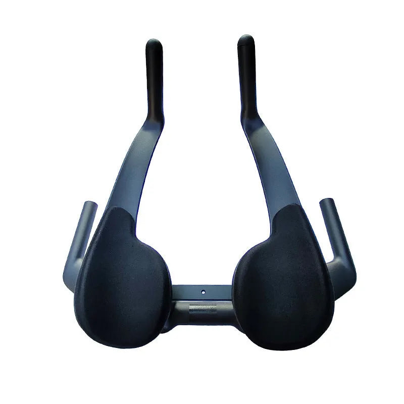 Black carbon fibre TT bicycle handlebars showing angled extensions and clamp area.