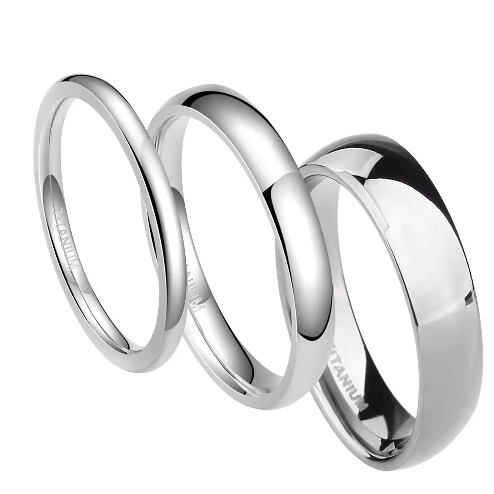 Matte silver titanium ring showing different band width options on a plain background