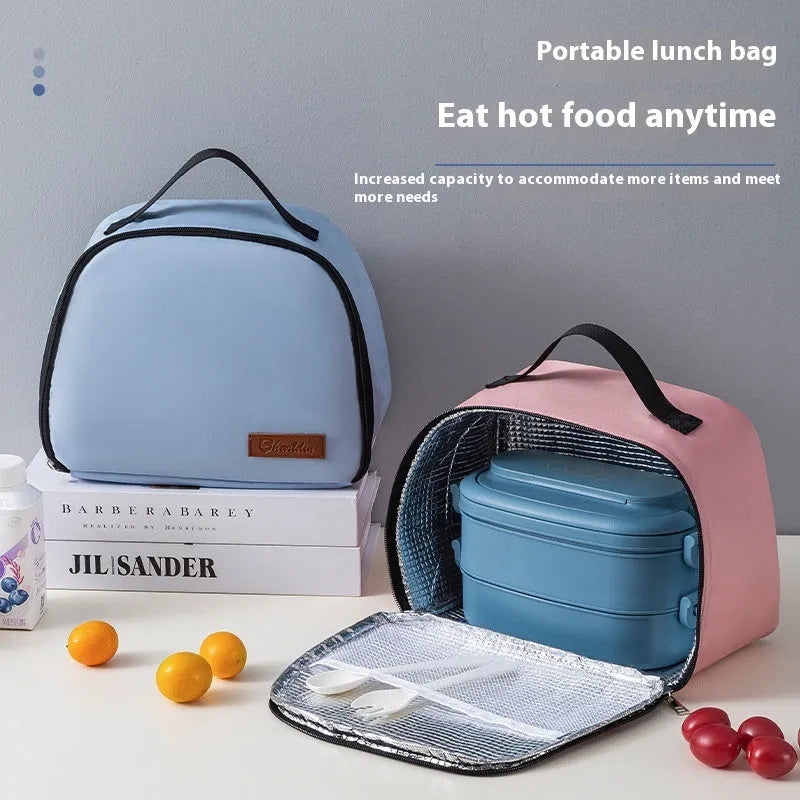 Textured cloth insulated lunch bag in sapphire blue colour with large capacity for a bento box.