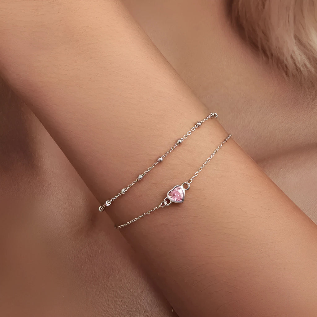 925 sterling silver bracelet with small heart pendant on an adjustable chain, style BSB152.