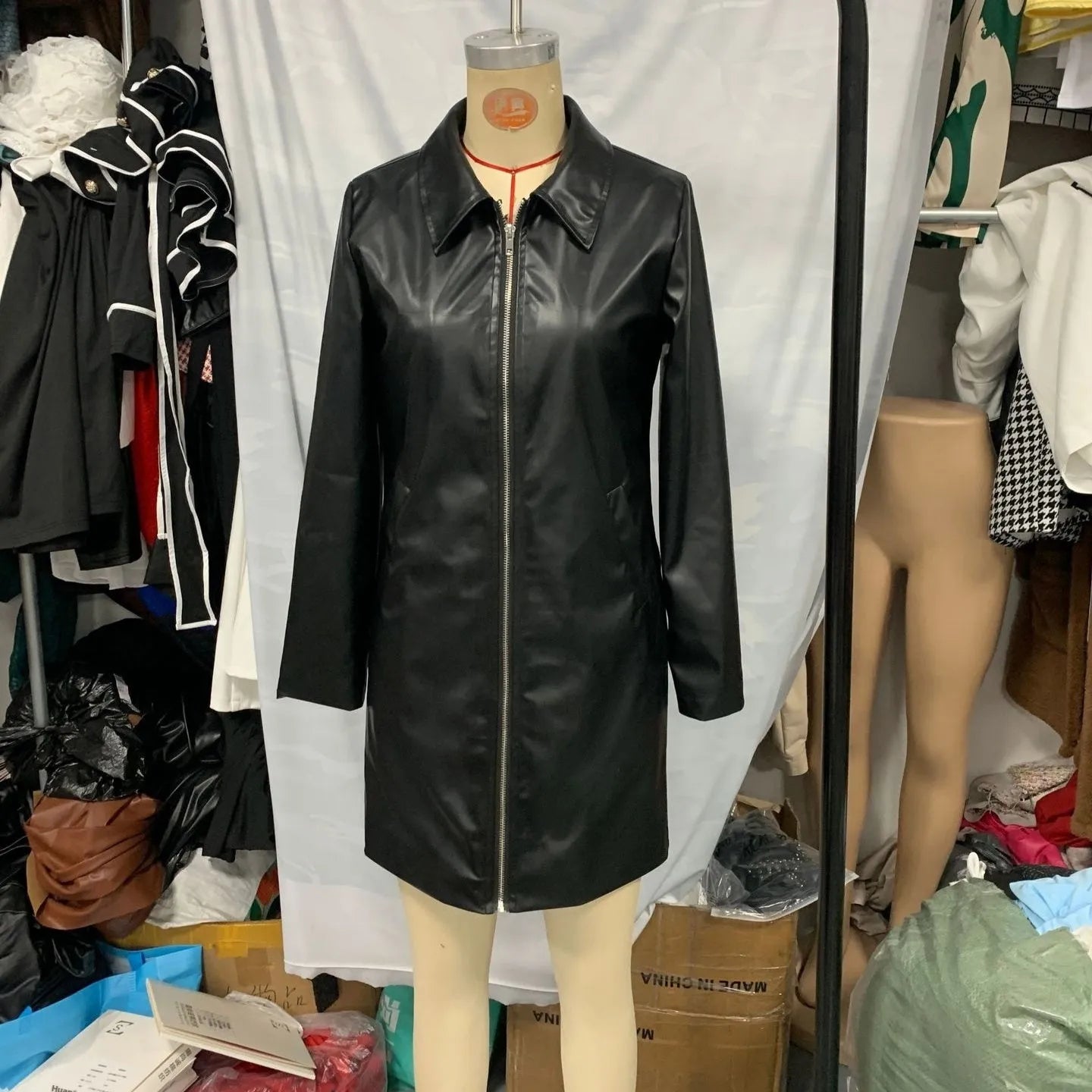 Black women's polyester leather jacket with medium length and long sleeves