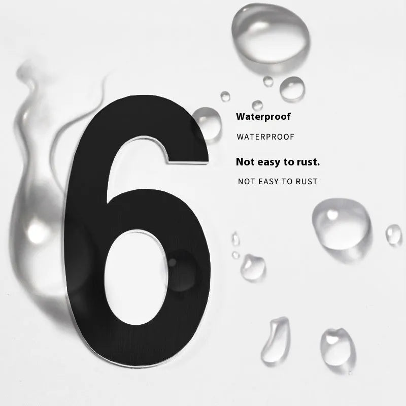 Black stainless steel sticky adhesive house number showing character size of 7.5cm.
